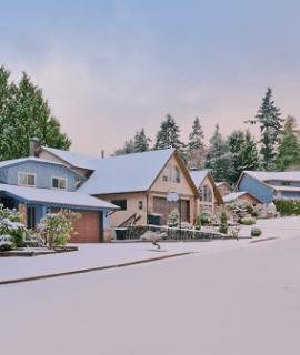 A snow covered residential neighborhood